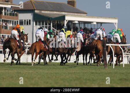 General view of horses racing at Folkestone Racecourse, Westenhanger, Kent Stock Photo