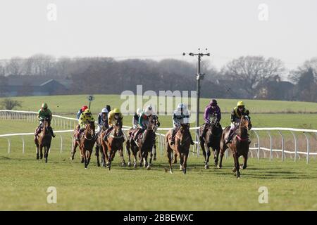 General view of horses racing at Folkestone Racecourse, Westenhanger, Kent Stock Photo