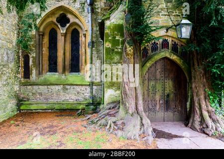 A side door and window in St. Edward's Parish Church in Stow-on-the-Wold in the Cotswolds in England Stock Photo