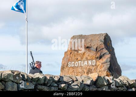 A welcoming piper at Carter Bar - Piper, Alan Smith,welcoming you over ...