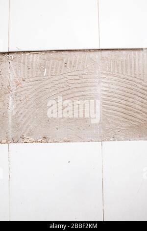 Broken white ceramic floor Stock Photo