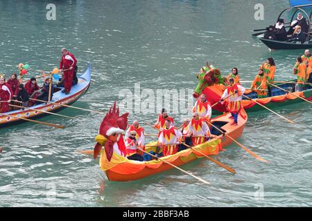 Venice, Italy-February 2020; high angle view of the Festa Veneziane on the Water with floating structures and people in boats in costumes at part of t Stock Photo