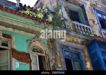 Close up view of one of the large neo-colonial houses in Largo do Boticario with Atlantic Forest vegetation Stock Photo