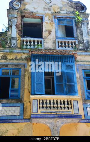 Close up view of the facade of one of the large neo-colonial houses in Largo do Boticario with Atlantic Forest v Stock Photo