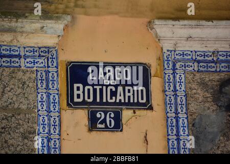 Close up view the street sign in the square with neo-colonial houses in Largo do Boticario with Atlantic Forest Stock Photo