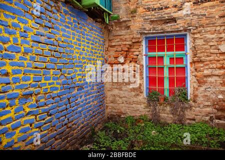 Corner in the courtyard, old brick walls and window Stock Photo