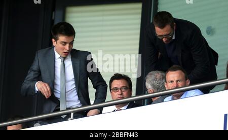 Sir Alex Ferguson's son's Mark (top right) and Jason (bottom centre) in the stands at The Hawthorns Stock Photo