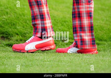 Detail of the golf trousers and shoes worn by England's Ian Poulter during Day One of the 2013 BMW PGA Championship, at Wentworth Golf Club. Stock Photo