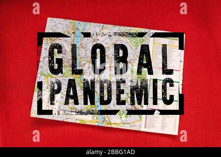Coronavirus, covid 19 concept. Global pandemic text stamp on the map on a red background Stock Photo