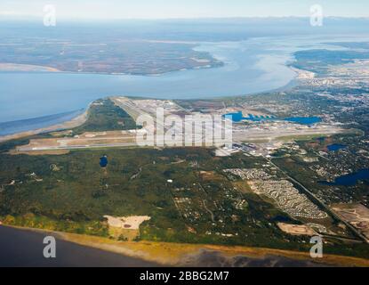Aerial overview of Ted Stevens International Airport in Alaska, USA. Kincaid Park and Anchorage Airport visible in a sunny day during summer. Stock Photo