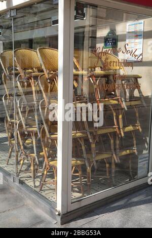 CORONAVIRUS: CAFES CLOSED, CONFINED CHAIRS  PARIS Stock Photo