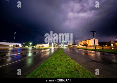 Storm with lightning strikes over city roads in Oklahoma City Oklahoma United States Stock Photo