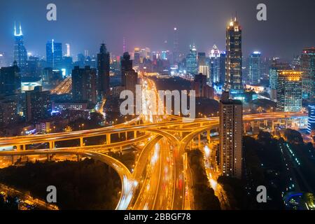 Shanghai Yanan Road overpass bridge at night with heavy traffic in China. Stock Photo