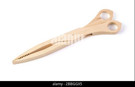 Wooden serving tongs isolated on white background Stock Photo