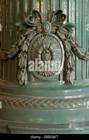 detail of green antique tiled Biedermeier stove with rich decorations Stock Photo