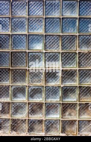Old grunge glass blocks wall as background texture Stock Photo