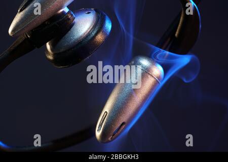 Electric wires with smoke photographed in the studio Stock Photo