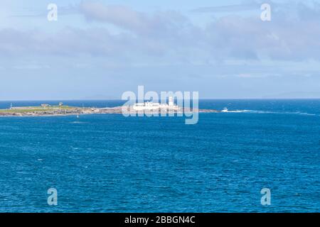 Beautiful view of Valentia Island Lighthouse at Cromwell Point. Locations worth visiting on the Wild Atlantic Way. Scenic Irish countyside on sunny Stock Photo