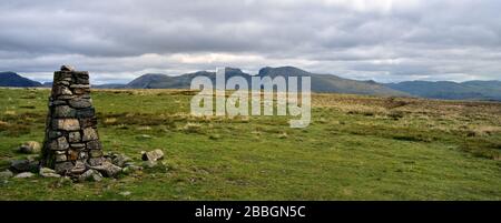 Large stone cairn on the summit of Seatallen Stock Photo