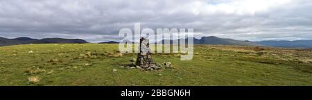 Large stone cairn on the summit of Seatallen Stock Photo