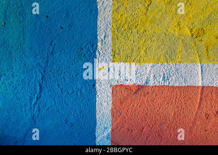 Floor of a concrete outdoor sports court, painted in an intense, vivid and saturated color, represents the concept of change, limit or transformation. Stock Photo