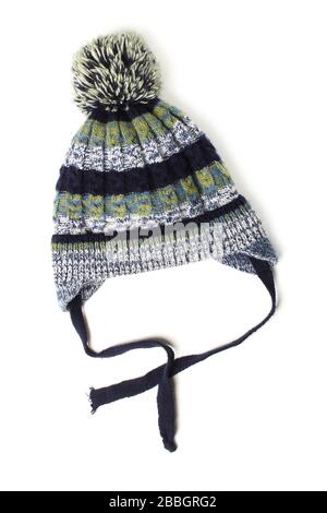 Children's knitted wool hat with pompon on a white background Stock Photo