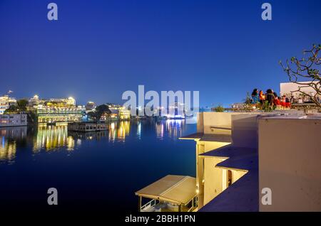 View over Lake Pichola at night from Jagat Niwas Palace Hotel, Old City, Udaipur, Rajasthan, India Stock Photo