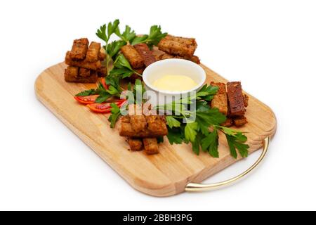 garlic croutons with sauce and parsley Stock Photo