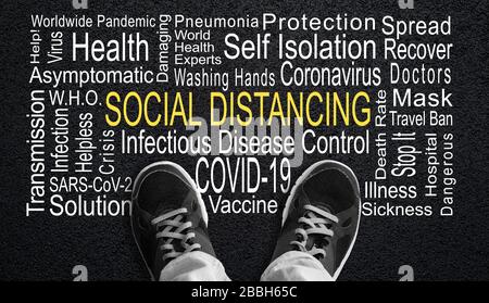 Person standing over Social Distancing word cloud. Concept of social distancing measure to control worldwide COVID-19 coronavirus pandemic. Black and Stock Photo