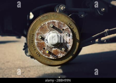 Car brake drum with stopping support without wheels closeup Stock Photo
