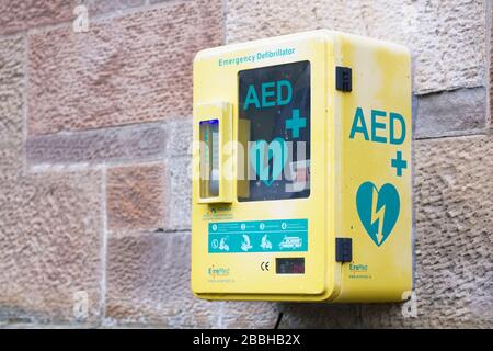 London, England / UK - November 22nd 2019: Defibrillator AED on wall in public space for emergency heart resuscitation Stock Photo