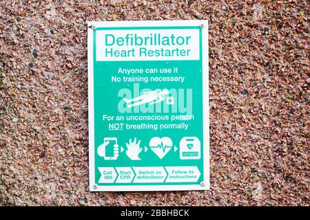 London, England / UK - November 22nd 2019: Defibrillator AED on wall in public space for emergency heart resuscitation Stock Photo