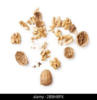 Walnut with nut shells isolated on white background. Top view of walnut shell. Stock Photo