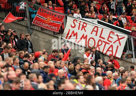 General view of banners in the stands showing support for Manchester United Stock Photo