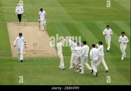 New Zealand's Neil Wagner (fourth left) is congratulated after England's Graeme Swann (left) is caught behind for 5 during the first test at Lord's Cricket Ground, London. Stock Photo