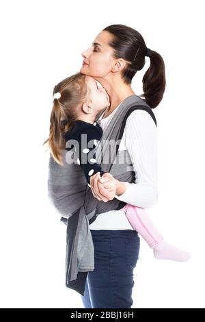 Mother and toddler child in woven wrap baby carrier vertical Stock Photo