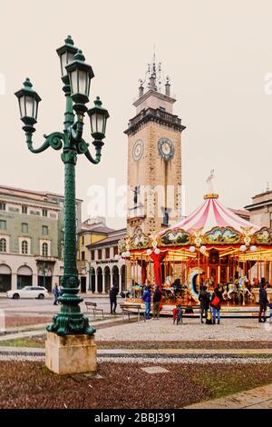 Milan, Italy circa January, 2020: Carousel on the historical city center square in Milan, Lombardy region in Northern Italy Stock Photo