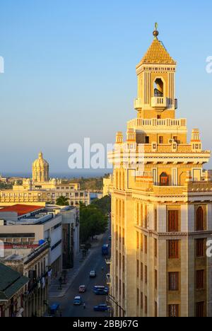 The famous art deco,  Bacardi Building, Edificio Bacardi with the  Museum of the Revolution, formerly the Presidential Palace beyond, Havana Vieja, Cuba Stock Photo