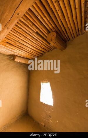 Ceiling details of vigas and latillas in a room within Pueblo Bonito in
