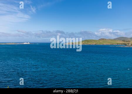 Beautiful view of Valentia Island Lighthouse at Cromwell Point. Locations worth visiting on the Wild Atlantic Way. Scenic Irish countyside on sunny Stock Photo