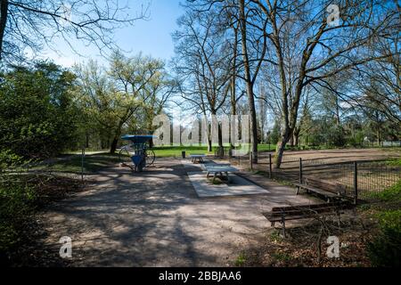 Strasbourg, France - Mar 18, 2020: Empty public park with sport fitness accessories closed due to coronavirus outbreak Stock Photo