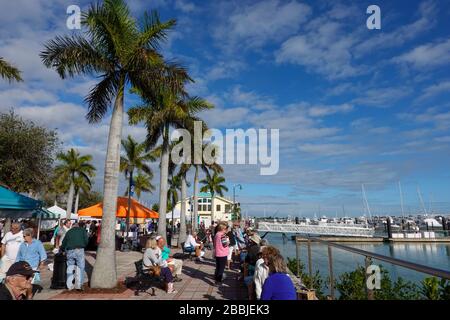 Ft. Pierce, FL/USA-1/25/20: People shopping at the farmer's market at Ft. Pierce, Florida on a sunny Saturday morning purchasing fruits, vegetables, f Stock Photo
