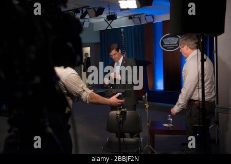 Arlington, United States Of America. 31st Mar, 2020. Arlington, United States of America. 31 March, 2020. U.S. Secretary of Defense Mark Esper prepares for a remote interview by Norah O'Donnell of CBS Evening News, about the DoD response to COVID-19, at the Pentagon March 31, 2020 in Arlington, Virginia. Credit: Lisa Ferdinando/DOD/Alamy Live News Stock Photo