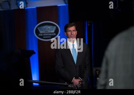 Arlington, United States Of America. 31st Mar, 2020. Arlington, United States of America. 31 March, 2020. U.S. Secretary of Defense Mark Esper during a remote interview by Norah O'Donnell of CBS Evening News, about the DoD response to COVID-19, at the Pentagon March 31, 2020 in Arlington, Virginia. Credit: Lisa Ferdinando/DOD/Alamy Live News Stock Photo
