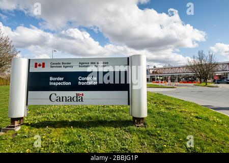 Surrey, Canada - Mar 29, 2020: Canadian Border Services Agency sign at entrance to Pacific Truck Crossing location during Coronavirus Covid-19 Canada Stock Photo