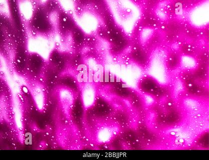 Pink background created by soap foam during a car wash Stock Photo