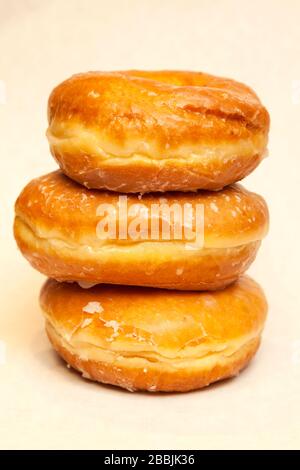 Glazed donuts, pastry, by James D Coppinger/Dembinsky Photo Assoc Stock Photo