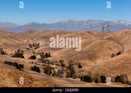 Green vegetation traces the winding path of water through Aliso Canyon, Chino Hills State Park, Chino, California, United States, North America, color Stock Photo