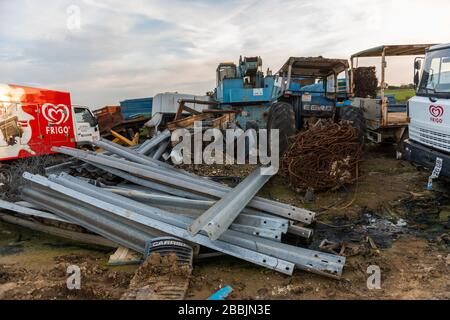Trucks, tractors and other metal parts abandoned in a scrap yard near Sierra de Fuentes, Extremadura, Spain. Stock Photo
