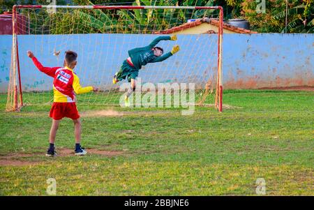 Boys playing soccer, Vinales, Pinar del Rio Province, Cuba Stock Photo